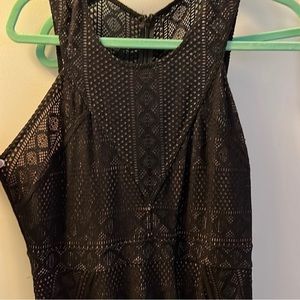 EUC BCBG “Dena” fitted knee length dress with sheer top area.
